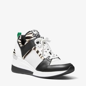 EUC Michael Kors Georgie Zebra Leather calf hair trainer wedge sneaker sz 7